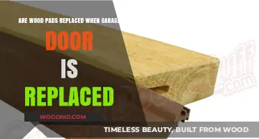 Do Wood Pads Need Replacement When Installing a New Garage Door?