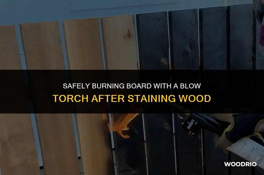 can i burn board blow torch after staining wood