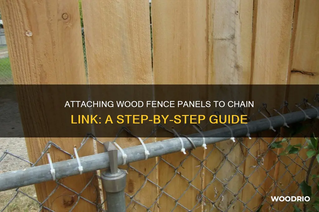 how are wood fence panels attached to chain link fence