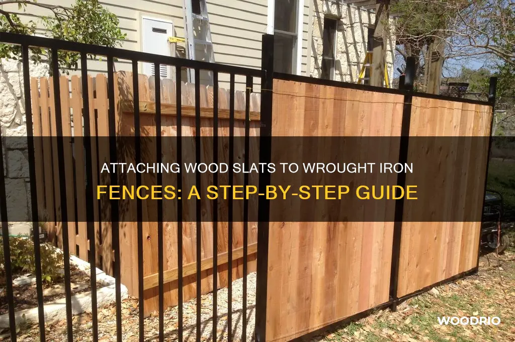 how do you attach wood slats to wrought iron fence