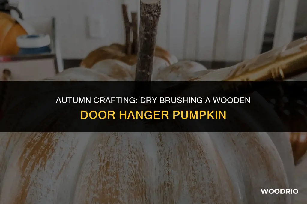 how do you dry brush a wooden door hanger pumpkin