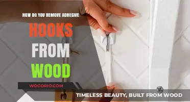 Efficiently Removing Adhesive Hooks from Wood Surfaces