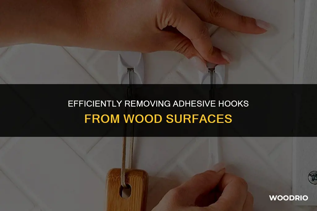 how do you remove adhesive hooks from wood