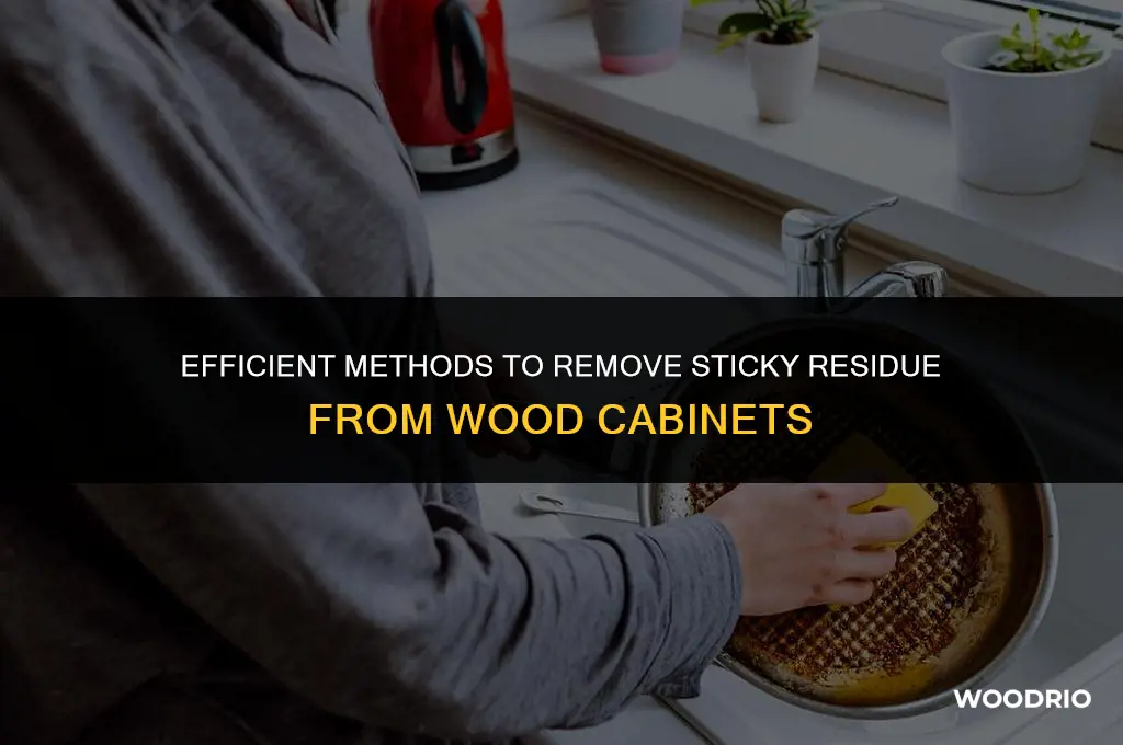 how do you remove sticky residue from wood cabinets