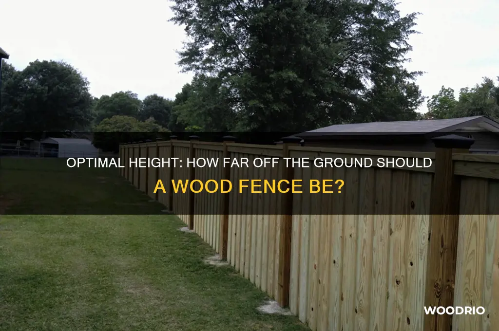 how far off the ground should a wood fence be