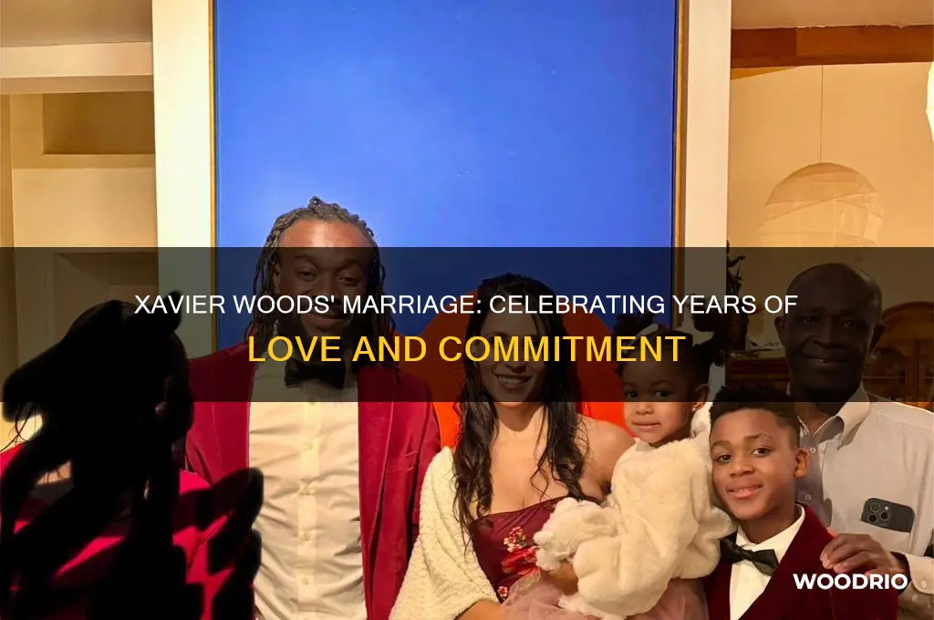 how long has xavier woods been married