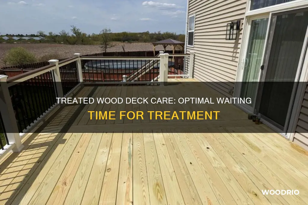 how long should you wait to treat trated wood deck