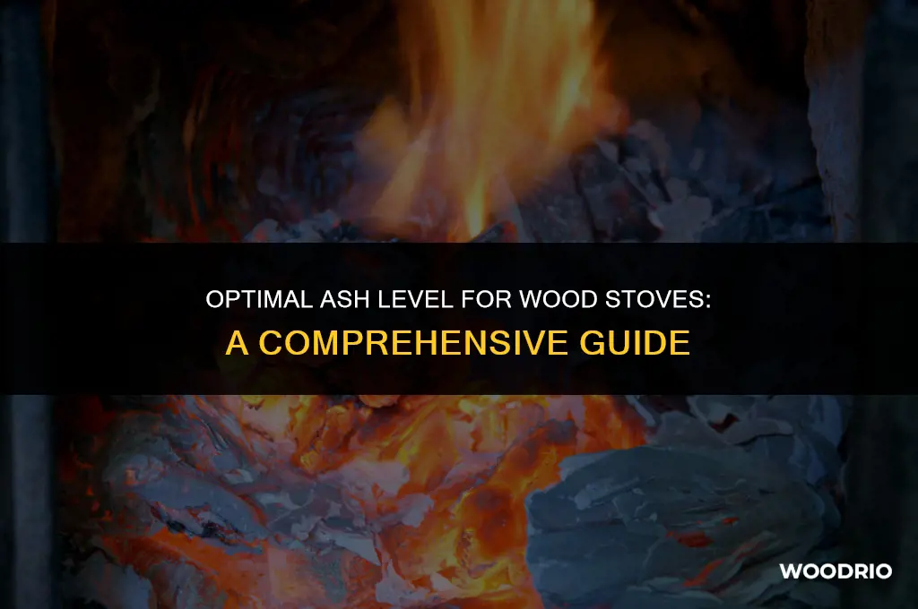 how much ash should i leave in wood stove