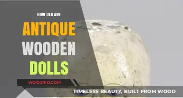 Unveiling the Timeless Charm of Antique Wooden Dolls' Ages