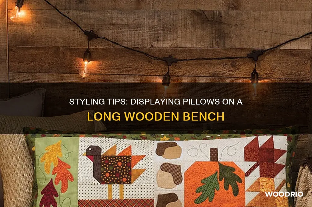 how ro display pillows on a long wooden bench