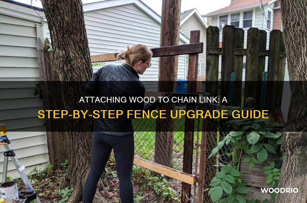 how to attach a wooded fence to a chain fence
