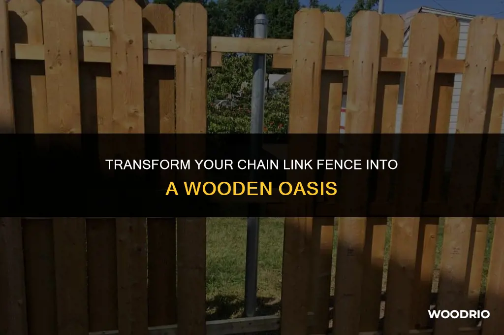 how to convert a chain link fence into wood
