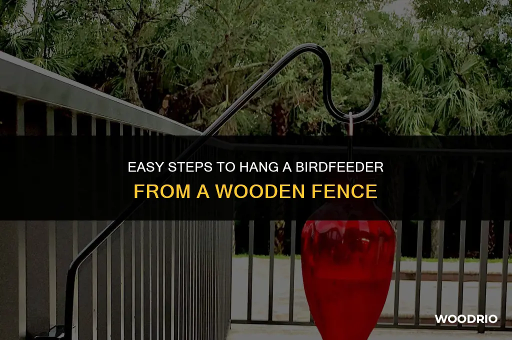how to hang a birdfeeder from a wooden fence