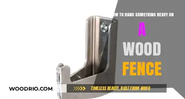 Sturdy Solutions: Hanging Heavy Items on Your Wooden Fence