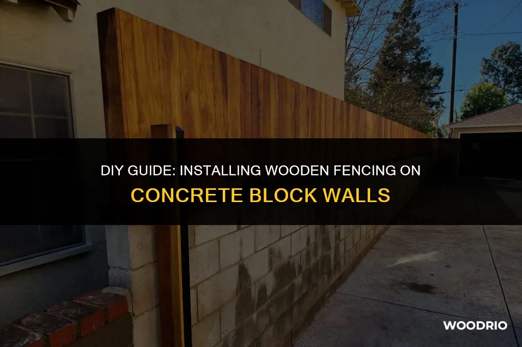 how to install wooden fencing on a concrete block wall