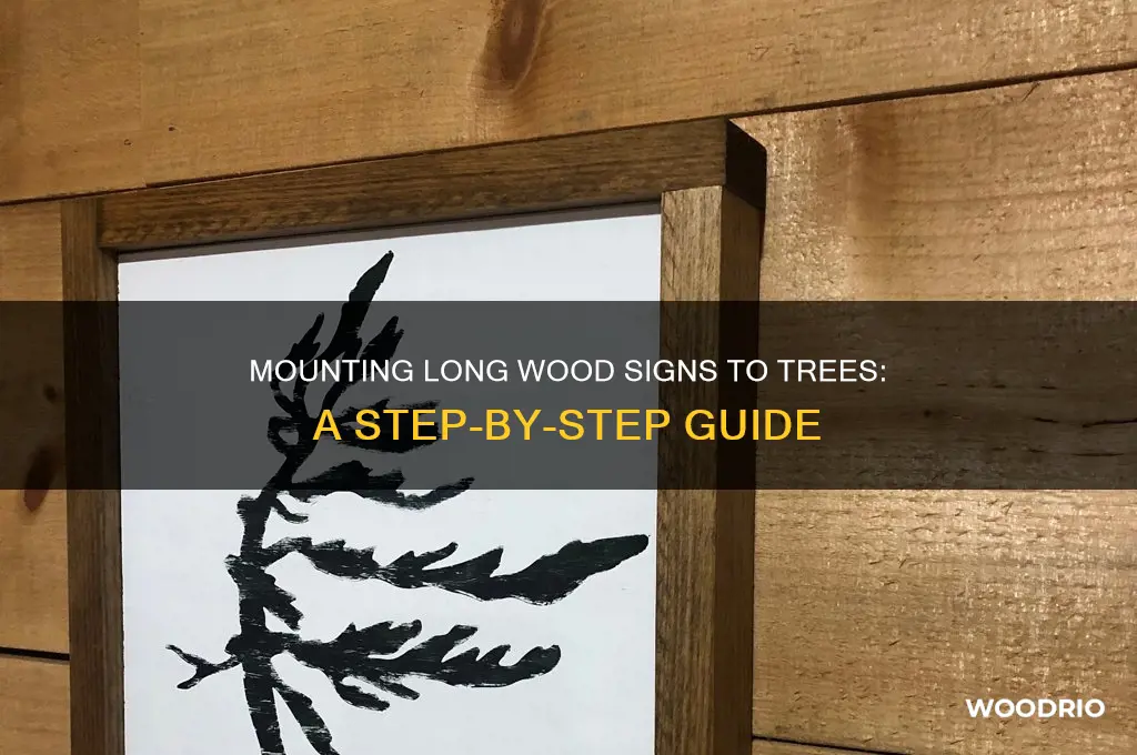how to mount a long wood sign to a tree