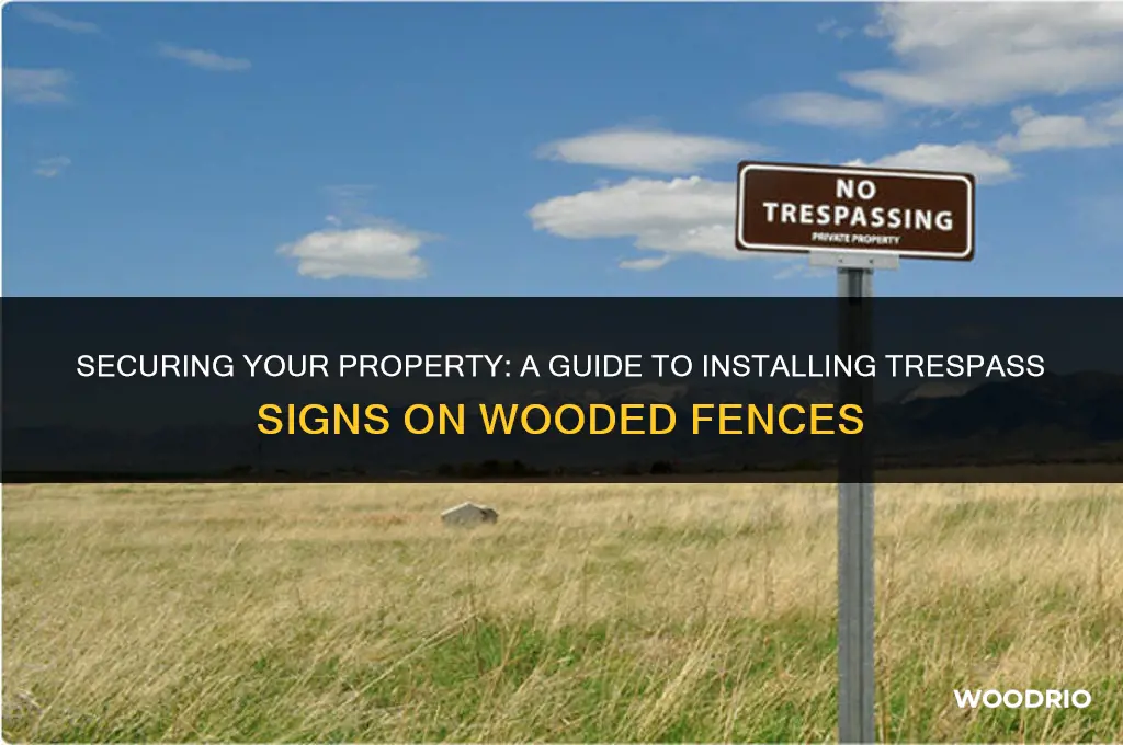 how to put up trespass sign on wooded fence