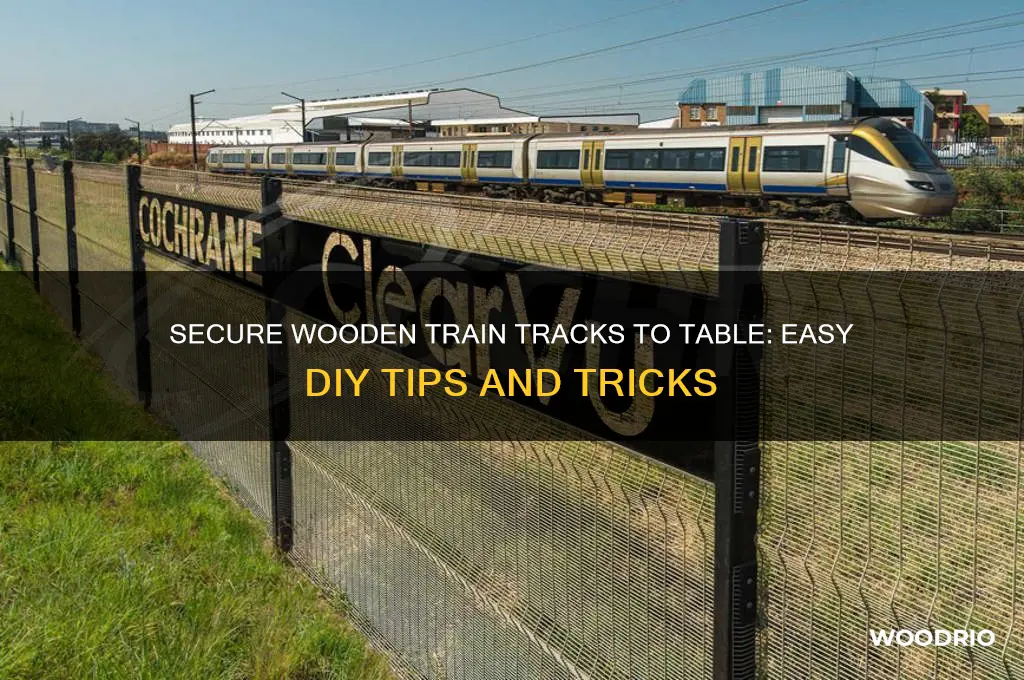how to secure wooden train tracks to table