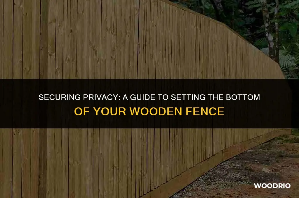 how to set the bottom of a wooden fence
