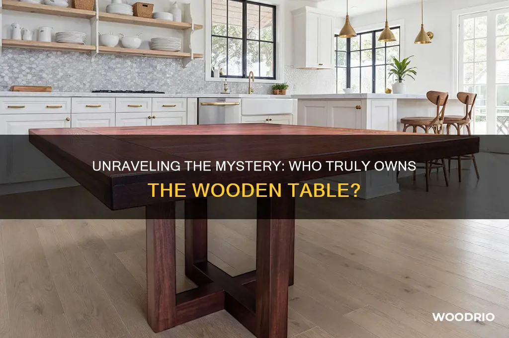 who owns the wooden table